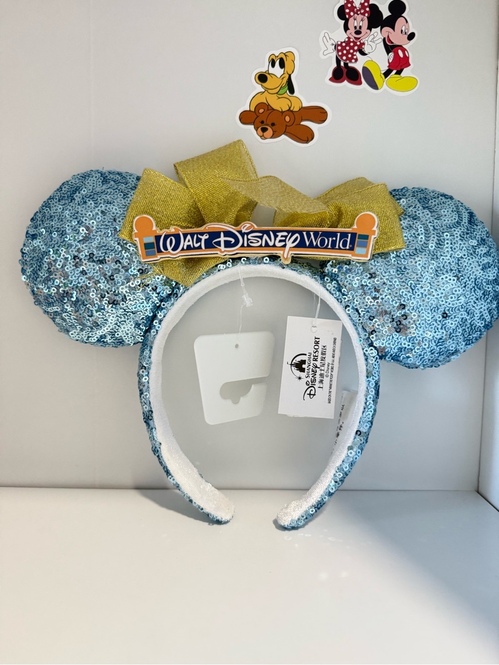Disney Walt Disney World Sequin Minnie Ears Headband in Light Blue with Gold Bow
